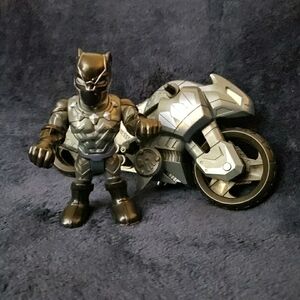 Hasbro Black and Silver Action Figure with Motorcycle